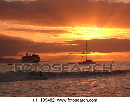 Stock Image -  Lahaina, Maui, HI, Hawaii, West Maui, Lahaina Harbor, Auau Channel, sunset, cruise ship. Fotosearch