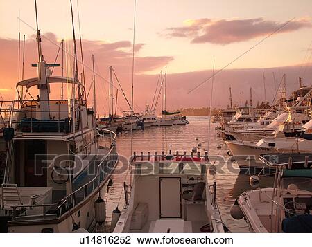 Stock Image -  Lahaina, Maui, HI, Hawaii, West Maui, Lahaina Harbor, marina, sunset. Fotosearch