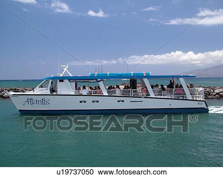 Stock Image -  Lahaina, Maui, HI, Hawaii, West Maui, Lahaina Harbor, Molokai passenger ferry. Fotosearch