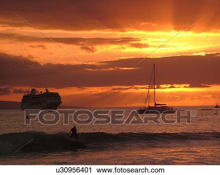 Stock Image -  Lahaina, Maui, HI, Hawaii, West Maui, Lahaina Harbor, Auau Channel, sunset, cruise ship. Fotosearch