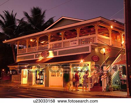 Stock Photo -  Lahaina, Maui, HI, Hawaii, West Maui, Historic Downtown, Front Street, Front Street Grill and Bar, evening. Fotosearch