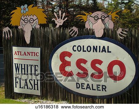 Littletown, NH, New Hampshire, Antique Gas Station Signs, ESSO, funny faces on the fence View Large Photo Image Stock Photo - Littletown, NH, New Hampshire, Antique Gas Station Signs, ESSO, funny faces on the fence. Fotosearch