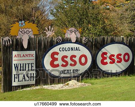 Littletown, NH, New Hampshire, Antique Gas Station Signs, ESSO, funny faces on the fence View Large Photo Image Stock Photo - Littletown, NH, New Hampshire, Antique Gas Station Signs, ESSO, funny faces on the fence. Fotosearch