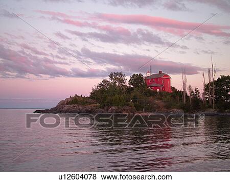 Stock Photo -  Marquette, MI, Michigan, Lake Superior, U. S. Coast Guard Lighthouse 1866, Lighthouse Point, Marquette Maritime Museum. Fotosearch