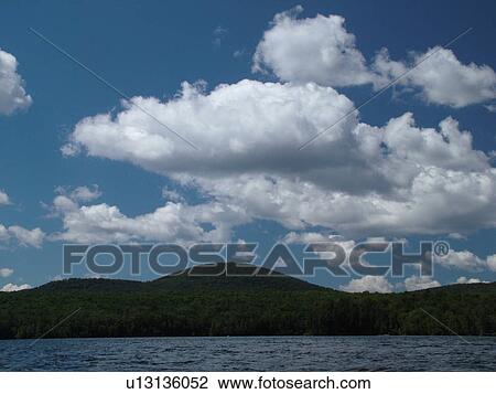 Marshfield, VT, Vermont, Marshfield Dam, Mollys Falls Pond, Cumulus Clouds, blue sky View Large Photo Image Stock Image - Marshfield, VT, Vermont, Marshfield Dam, Mollys Falls Pond, Cumulus Clouds, blue sky. Fotosearch