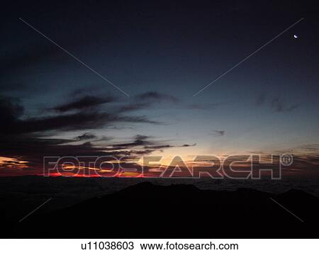 Stock Image -  Maui, HI, Hawaii, Haleakala National Park, Haleakala Visitor Center Overlook, volcano, sunrise. Fotosearch