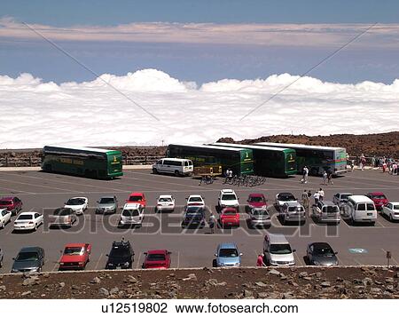 Stock Image -  Maui, HI, Hawaii, Haleakala National Park, Haleakala Visitor Center Overlook, parking lot. Fotosearch