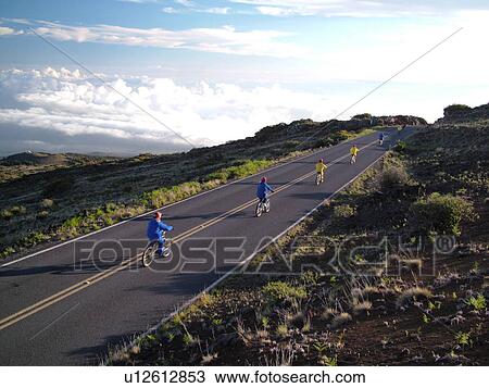 Stock Image -  Maui, HI, Hawaii, Haleakala National Park, Haleakala Crater Road, bike down a volcano. Fotosearch