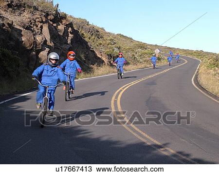 Stock Image -  Maui, HI, Hawaii, Haleakala National Park, Haleakala Crater Road, bike down a volcano. Fotosearch