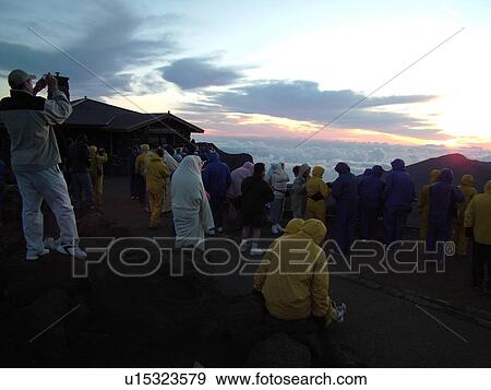 Stock Photo -  Maui, HI, Hawaii, Haleakala National Park, Haleakala Visitor Center Overlook, volcano, sunrise. Fotosearch