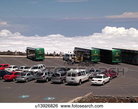 Stock Photograph -  Maui, HI, Hawaii, Haleakala National Park, Haleakala Visitor Center Overlook, parking lot. Fotosearch