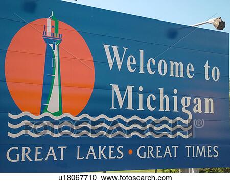 Stock Image -  MI, Michigan, Welcome to Michigan, Great Lakes, Great Times, sign, state line. Fotosearch