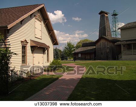 Stock Photo -  Midland, MI, Michigan, Herbert H. Dow Historical Museum, Bradley House Museum & Carriage House. Fotosearch