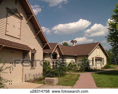 Stock Photo -  Midland, MI, Michigan, Herbert H. Dow Historical Museum, Bradley House Museum & Carriage House. Fotosearch