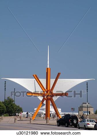 Stock Image -  Milwaukee, WI, Wisconsin, Downtown, Milwaukee Art Museum, large orange sculpture. Fotosearch