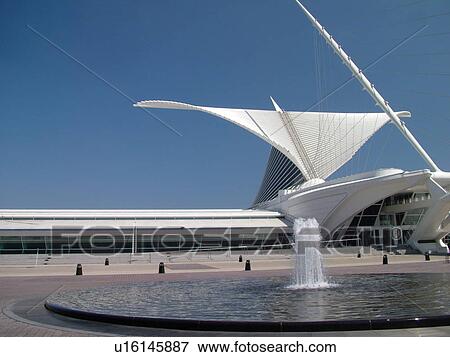 Stock Photo -  Milwaukee, WI, Wisconsin, Downtown, Milwaukee Art Museum, lakefront, fountain, reflecting pool. Fotosearch