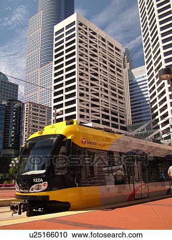 Stock Image -  Minneapolis, MN, Minnesota, Twin Cities, Downtown, Government Plaza, Metro Transit, light rail, tram, train. Fotosearch