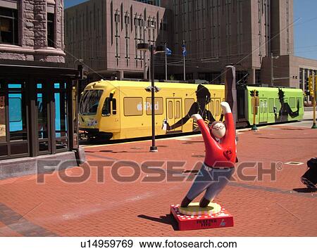 Minneapolis, MN, Minnesota, Twin Cities, Downtown, Government Plaza, Metro Transit, light rail, tram, IPOD advertising, Forever Five statue View Large Photo Image Stock Photo - Minneapolis, MN, Minnesota, Twin Cities, Downtown, Government Plaza, Metro Transit, light rail, tram, IPOD advertising, Forever Five statue. Fotosearch