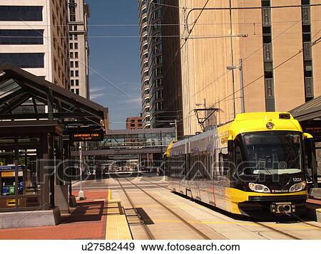 Stock Photo -  Minneapolis, MN, Minnesota, Twin Cities, Downtown, Government Plaza, Metro Transit, light rail, tram, train. Fotosearch