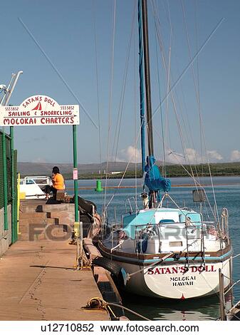 Stock Image -  Molokai, HI, Hawaii, Kaunakakai Wharf, harbor. Fotosearch