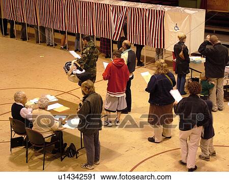 Stock Image -  Montpelier, VT, Vermont, City Hall, interior, Election Day, 2004, Voting Booths. Fotosearch
