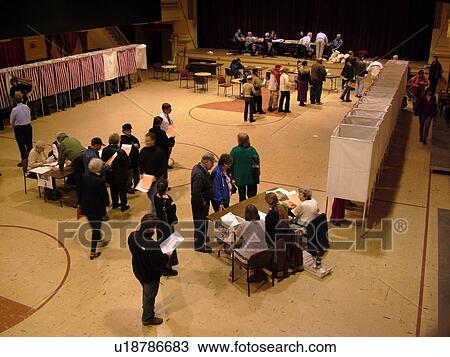 Stock Image -  Montpelier, VT, Vermont, City Hall, interior, Election Day, 2004, Voting Booths. Fotosearch