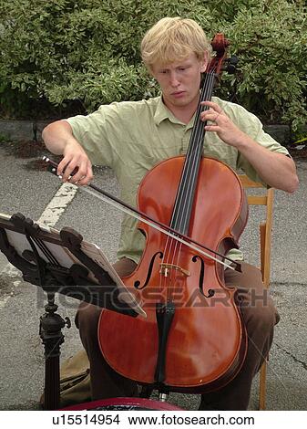 Picture -  Montpelier, VT, Vermont, Farmer's Market, street musician, cello, donations, save the musicians. Fotosearch