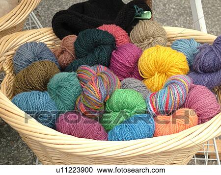 Stock Image -  Montpelier, VT, Vermont, Farmer's Market, Yarn in a basket. Fotosearch