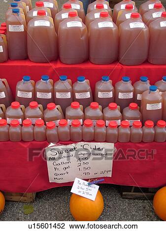 Stock Image -  Montpelier, VT, Vermont, Farmer's Market, Apple Cider. Fotosearch