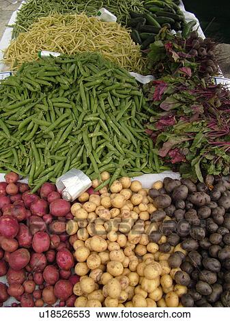 Stock Image -  Montpelier, VT, Vermont, Farmer's Market, Potatoes, Sugar Snap Peas, Yellow, Green, Beans. Fotosearch