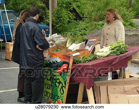 Stock Image -  Montpelier, VT, Vermont, Farmer's Market, vendor. Fotosearch