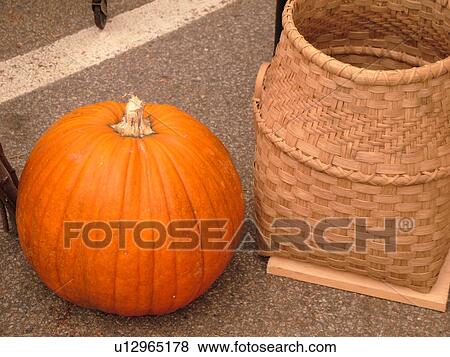 Stock Photo -  Montpelier, VT, Vermont, Farmer's Market, Pumpkin, basket. Fotosearch