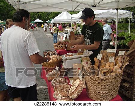 Stock Photo -  Montpelier, VT, Vermont, Farmer's Market, vendor, bread. Fotosearch