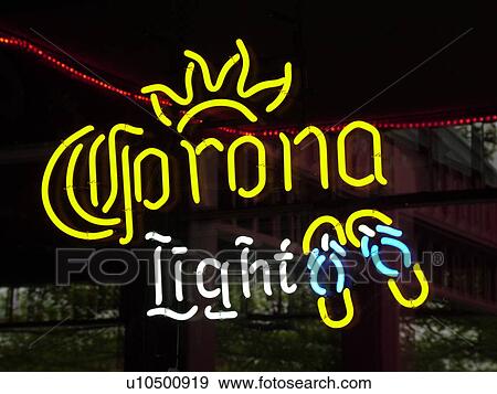 Stock Photo -  Montpelier, VT, Vermont, Neon Corona Light Beer sign, window. Fotosearch