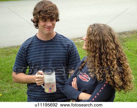 Stock Image -  Montpelier, VT, Vermont, teenager couple, boyfriend, girlfriend. Fotosearch