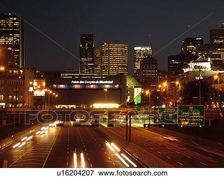 Stock Photo -  Montreal, Canada, QC, Quebec, Auto Route Ville Marie, I-720, interstate, expressway, evening. Fotosearch