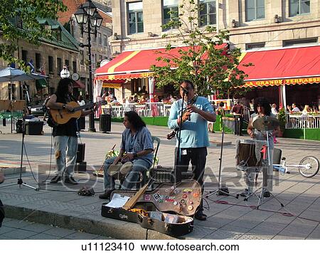Stock Image -  Montreal, Canada, QC, Quebec, Old Port, Old Montreal, Place Jacques Cartier, street musicians. Fotosearch