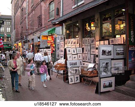 Stock Photo -  Montreal, Canada, QC, Quebec, Old Port, Old Montreal, Place Jacques Cartier, Rue Saint Amable, street artists. Fotosearch