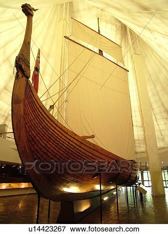 Moorhead, MN, Minnesota, Heritage Hjemkomst Interpretive Center, ancient Viking ship the Hjemkomst displayed View Large Photo Image Stock Photo - Moorhead, MN, Minnesota, Heritage Hjemkomst Interpretive Center, ancient Viking ship the Hjemkomst displayed. Fotosearch