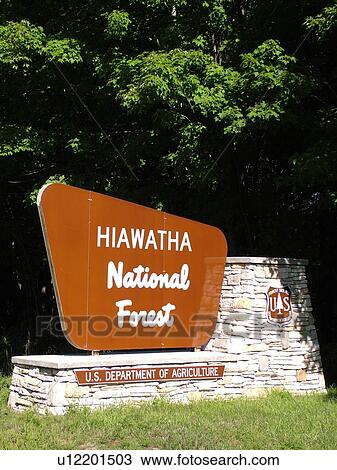 Stock Image -  Munising, MI, Michigan, Hiawatha National Forest, entrance sign. Fotosearch
