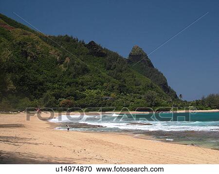 Stock Image -  Napali Coast, Kauai, HI, Hawaii, North Shore, Na Pali, Haena Beach Park, Tunnels Beach. Fotosearch