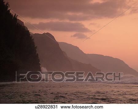Stock Image -  Napali Coast, Kauai, HI, Hawaii, North Shore, Na Pali, Kalalau Trail, Kee Beach, Haena State Park, sunset. Fotosearch