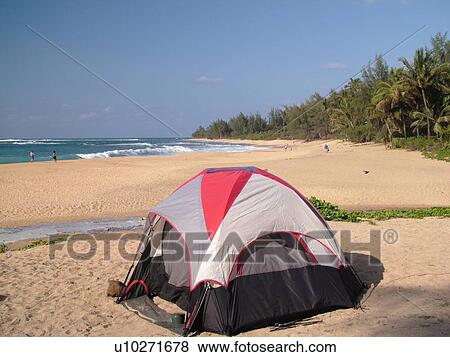 Stock Photo -  Napali Coast, Kauai, HI, Hawaii, North Shore, Na Pali, Haena Beach Park, Tunnels beach, camping. Fotosearch