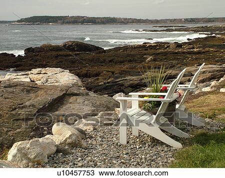 Stock Image -  Newagen, ME, Maine, Southport Island, two Adirondack chairs. Fotosearch