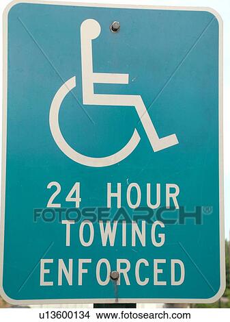 Picture -  parking sign, Handicap Parking Only, 24 Hour Towing Enforced, . Fotosearch