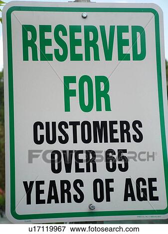 Stock Photo -  parking sign, Reserved for Customers Over 65 Years of Age. Fotosearch