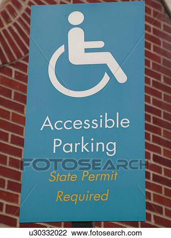Stock Image -  parking sign, Reserved Parking for Handicapped sign, wheelchair accessible parking, . Fotosearch