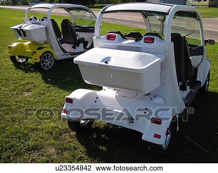 Stock Image -  Petoskey, MI, Michigan, Electric cars, GEM, Global Electric Motorcars, Daimler/Chrysler Company. Fotosearch