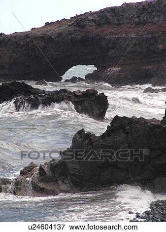 Stock Photo -  Piilani Highway, Maui, HI, Hawaii, East Maui, Sea Arch. Fotosearch