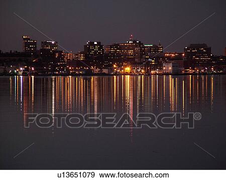 Stock Photo -  Portland, ME, Maine, Fore River, Casca Bay, Portland Harbor, evening, reflection. Fotosearch